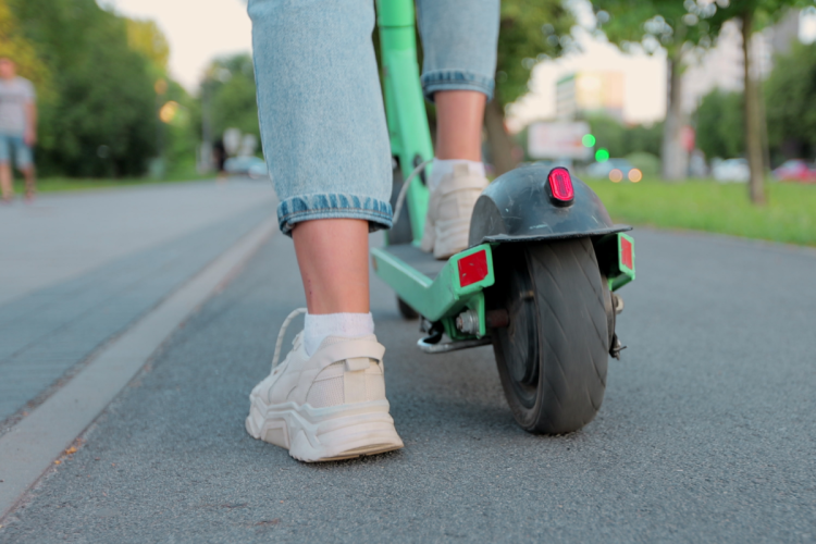 Woman on e-scooter