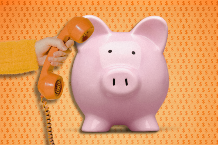 piggy bank with large phone pressed to its ear by a hand