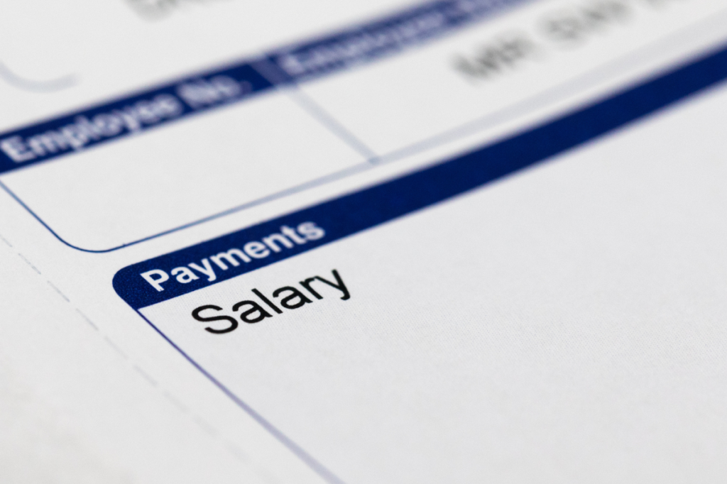 Close-up of a payslip showing earnings, deductions and superannuation.