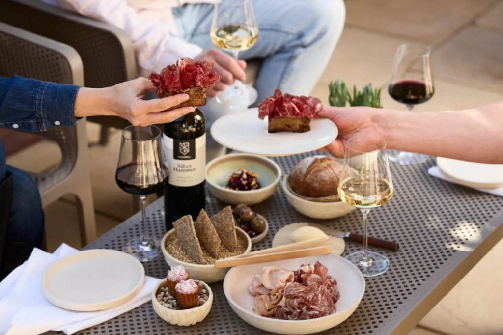 Guests enjoying the snacks and wine at the Maxwell Wines Cellar Door