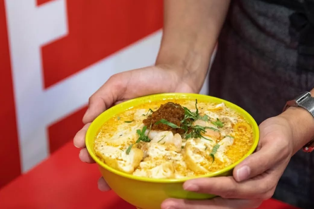 Where (and when) to find Australia's best Sarawak-style laksa is one of the secrets revealed during the Market's free audio tour.