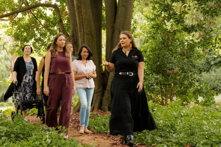 Bookabee Australia's Iteka Sanderson-Bromley conducts an Aboriginal cultural tour through the Adelaide Botanic Garden.