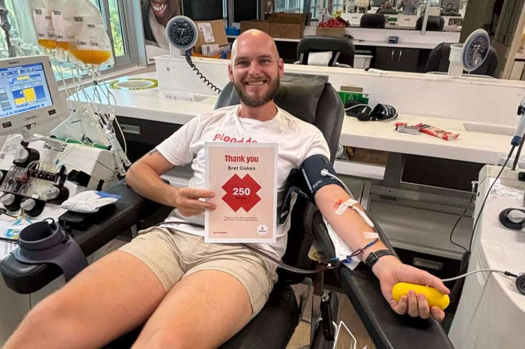 Brett at the Marion Lifeblood donor centre making his 250th platelets donation.