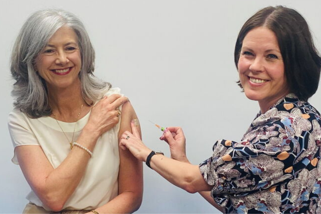SA Health’s chief public health officer, Professor Nicola Spurrier, receives her flu vaccination from Dr Siân Goodson.