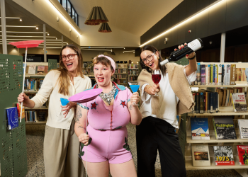 Erin Sundstrom, Lucy Frost and Kameron Bazzo learning to juggle while enjoying cocktails at a South Australian library