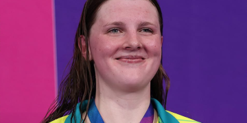 SA swimmer makes Comm Games history